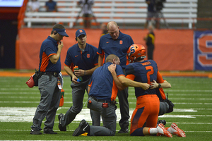 Eric Dungey left the game against Central Michigan two years ago after being hit near his head by defensive lineman Mitch Stanitzek.