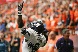 Demetrius Fields celebrates his game-winning touchdown in Northwestern's 42-41 win over Syracuse Saturday. 