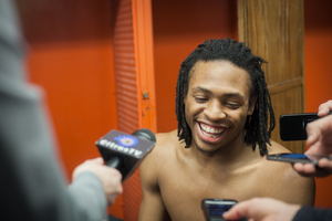 Ron Patterson laughs in front of his locker after the best performance of his young collegiate career. 