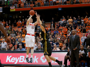 Trevor Cooney wasn't sharp for the second straight exhibition game, going 2-of-9 from 3-point range in Syracuse's 84-35 blowout of Adrian on Monday night. 