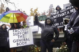 Nikeeta Slade, a member of THE General Body, speaks at a rally that was held near the Remembrance Wall on Monday afternoon. The rally was organized by faculty members, many of whom attended the rally to show support for the sit-in at Crouse-Hinds Hall. 