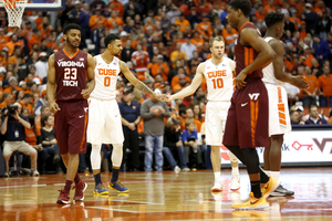 Michael Gbinije has scored in double digits in every game Syracuse has played this season. He was named to the All-ACC second team on Sunday. 