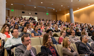 More than 100 Syracuse University community members attended a forum in Dineen Hall on Friday.