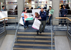 John Sardino, associate chief of the department’s law enforcement and community policing division, forcibly removed protester Ariel Gold.