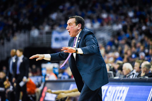 Duke head coach Mike Krzyzewski yells from the sideline in last season's Sweet 16 matchup with Syracuse.