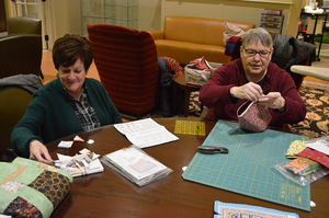 Barbara Rawlings (left) and Judith O’Rourke are members of Hendricks Chapel Quilters, a group that creates quilts to donate to local nonprofits.