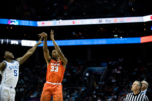 Elijah Hughes takes a jumper in Syracuse's ACC Tournament matchup with Duke.