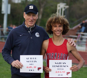 Nathan Henderson after breaking the mile record at J.P. McCaskey High School.