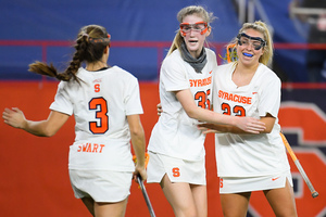 Syracuse trailed by three goals at halftime but came back, beating Notre Dame to remain undefeated.