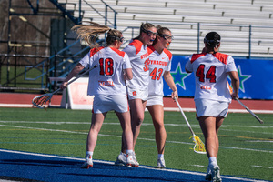 Emma Tyrrell's four goals and Delaney Sweitzer's career-high with 15 saves helped the Orange hand No. 5 North Carolina its first home loss of the season.