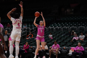 Georgia Woolley scored 10 of her season-high 24 points in the fourth quarter in SU's fourth-straight win.