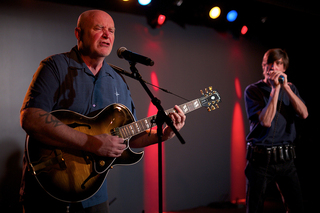 Dennis Kinsey, a S.I Newhouse School of Public Communications professor, sings the blues with his bandmate Mike Petroff. 