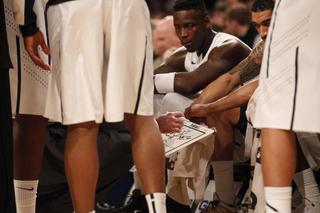 Pittsburgh's head coach Jamie Dixon plans during a time out called in the first half.