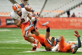 Syracuse cornerback Ri'Shard Anderson attempts an interception.