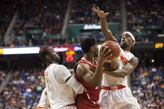 Fair and Keita trap an N.C. State player trying to find an open teammate. 