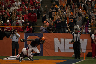 Syracuse wide receiver Steve Ishmael reacts after hauling in a touchdown pass from Long early in the third quarter.