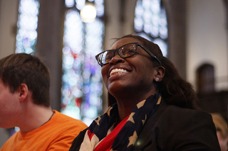 Nodesia Hernandez, one of the event’s organizers, said her scarf features red, blue and beige, rather than white, to recognize the changing demographics in the United States.