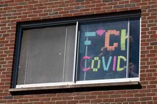 Sept. 3: Watson Hall residents spell out “F*ck COVID” with Post-it notes. Their window faces Ernie Davis Hall, which SU placed under quarantine that same day after detecting COVID-19 in its wastewater.