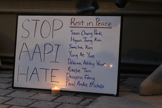 A sign made to remember the victims of the recent act of violence against the Asian American community. Sign reads: Stop AAPI Hate. Rest in peace: Soon Chung Park, Hyun Jung Kim, Suncha Kim, Yong Ae Yue, Delaina Ashley Yaun, Xiaojie Tan, Daoyou Feng, Paul Andre Michels.