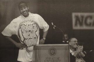 The NCAA Tournament’s Most Outstanding Player Carmelo Anthony speaks to a crowd of more than 25,000 fans at the celebration for the Orangemen in the Carrier Dome on April 10, 2003.