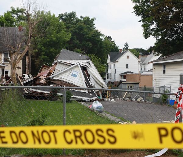 Syracuse home collapses, hospitalizes 11